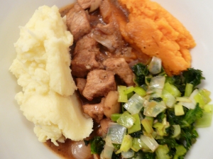 Pork stew with mashed potato and sweet potato